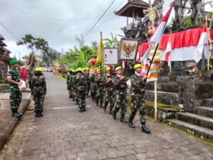 Semarak Peringatan Puputan Margarana ke-79, Danramil Marga Sambut Pataka dan Panji Pahlawan Nasional