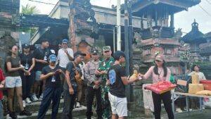 Babinsa Kerambitan Aktif Amankan dan Meriahkan Jalan Santai HUT STT Eka Cita ke-47