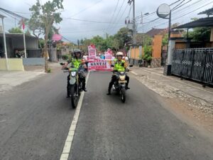Danramil 1617-01/Negara Pimpin Personel Babinsa Amankan Jalan Santai dan Baksos HUT RI Ke-81 di Pendem